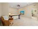 Spacious Gathering room with a large TV and comfortable seating at 6223 90Th Avenue E Cir, Parrish, FL 34219
