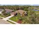 Single-Gathering home with a landscaped yard and pond view at 6223 90Th Avenue E Cir, Parrish, FL 34219