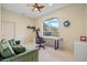 Home office with a large window, built-in desk and comfortable seating at 6223 90Th Avenue E Cir, Parrish, FL 34219