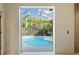 View of a refreshing pool through an interior doorway at 6223 90Th Avenue E Cir, Parrish, FL 34219