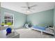 Cozy bedroom with a large window and plenty of natural light at 6223 90Th Avenue E Cir, Parrish, FL 34219