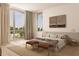 Main bedroom with a plush bed and calming earth tones at 6489 Gulfside Rd, Longboat Key, FL 34228