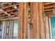 Framing during a new construction phase showing TimberStrand beams and other framing members at 6489 Gulfside Rd, Longboat Key, FL 34228