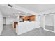 Modern kitchen with stainless steel appliances and granite countertops at 800 N Tamiami Trl # 307, Sarasota, FL 34236