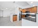 Modern kitchen featuring stainless steel appliances and granite countertops at 800 N Tamiami Trl # 307, Sarasota, FL 34236