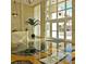 Elegant building lobby with reception desk and seating area at 800 N Tamiami Trl # 307, Sarasota, FL 34236