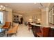 Elegant lounge area with comfortable seating, a bar, and stylish decor at 800 N Tamiami Trl # 307, Sarasota, FL 34236