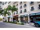 View of a streetscape with shops and restaurants at 800 N Tamiami Trl # 307, Sarasota, FL 34236