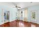 Spacious bedroom with hardwood floors and access to a private bathroom at 810 S Edison Ave, Tampa, FL 33606