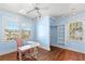 Charming bedroom with hardwood floors and built-in shelving at 810 S Edison Ave, Tampa, FL 33606