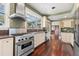 Kitchen with stainless steel appliances and granite countertops at 810 S Edison Ave, Tampa, FL 33606