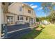 Spacious back deck with access to a fenced backyard at 810 S Edison Ave, Tampa, FL 33606