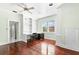 Bright home office with hardwood floors and built-in shelving at 810 S Edison Ave, Tampa, FL 33606