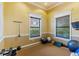 Fitness center with various exercise equipment and large windows at 8377 38Th Street E Cir # 308, Sarasota, FL 34243