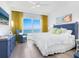 Bright bedroom with ocean view and stylish decor at 915 Seaside Dr # 407, Sarasota, FL 34242