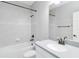 Clean bathroom with tub, shower, vanity, and neutral decor at 13148 Bliss Loop, Bradenton, FL 34211