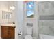 Bathroom with toilet, bathtub, and shower at 13148 Bliss Loop, Bradenton, FL 34211