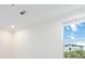 Bright bedroom with a window offering an outdoor view at 13148 Bliss Loop, Bradenton, FL 34211