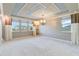 Main bedroom with neutral walls and plush carpeting at 13148 Bliss Loop, Bradenton, FL 34211