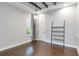 Home office with hardwood floors, neutral walls, and a modern shelving unit at 13148 Bliss Loop, Bradenton, FL 34211