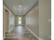 Hallway with recessed lighting and luxury vinyl plank flooring at 160 Apollo Dr, Rotonda West, FL 33947