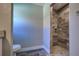 Walk-in shower with wood-look tile and built-in seat at 160 Apollo Dr, Rotonda West, FL 33947
