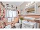 Clean bathroom with updated vanity and tiled shower at 2057 Garden Pkwy, Bradenton, FL 34205