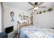 Bright bedroom with a double bed and built-in shelving at 2057 Garden Pkwy, Bradenton, FL 34205