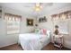 Comfortable bedroom with a double bed and nautical decor at 2057 Garden Pkwy, Bradenton, FL 34205
