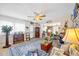 Spacious living room with hardwood floors, ceiling fan and open floor plan at 2057 Garden Pkwy, Bradenton, FL 34205
