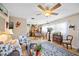 Living room with hardwood floors, ceiling fan and an open floor plan at 2057 Garden Pkwy, Bradenton, FL 34205