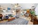 Bright and spacious living room featuring hardwood floors and an open floor plan at 2057 Garden Pkwy, Bradenton, FL 34205