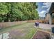 Backyard with garden and wooden fence at 228 36Th Ne St, Bradenton, FL 34208