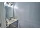 Small bathroom with a single sink and gray walls at 228 36Th Ne St, Bradenton, FL 34208