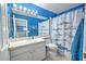 Bathroom with a shower/tub combo and white vanity at 228 36Th Ne St, Bradenton, FL 34208