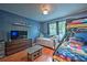 Bedroom with twin and full-size beds, and wood floors at 228 36Th Ne St, Bradenton, FL 34208