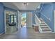 Bright and spacious entryway with wood-look floors and staircase at 228 36Th Ne St, Bradenton, FL 34208