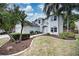 Two-story house with landscaping and palm trees at 228 36Th Ne St, Bradenton, FL 34208