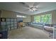 Spacious loft area with a couch and home office space at 228 36Th Ne St, Bradenton, FL 34208