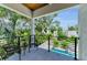View of lush landscaping from private balcony at 2425 Floyd St, Sarasota, FL 34239