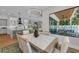 Dining area featuring natural light, a view of the back yard and access to the kitchen at 2425 Floyd St, Sarasota, FL 34239