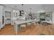 Open kitchen featuring a large island, breakfast bar seating, and a view into the living area at 2425 Floyd St, Sarasota, FL 34239