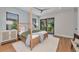 Spacious main bedroom with private balcony access at 2425 Floyd St, Sarasota, FL 34239