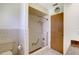 Bathroom with walk-in shower and grab bars at 2711 W Marion Ave, Punta Gorda, FL 33950