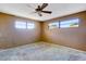 Simple bedroom with neutral walls and carpet at 2711 W Marion Ave, Punta Gorda, FL 33950