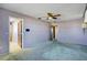 Spacious bedroom with carpeted floor and ceiling fan at 2711 W Marion Ave, Punta Gorda, FL 33950