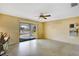 Bright living room featuring water views and sliding glass doors at 2711 W Marion Ave, Punta Gorda, FL 33950