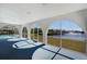 Screened porch with pool and water views at 2711 W Marion Ave, Punta Gorda, FL 33950