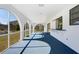 Spacious screened porch overlooking the backyard at 2711 W Marion Ave, Punta Gorda, FL 33950