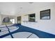 Screened porch with water views and built-in bar at 2711 W Marion Ave, Punta Gorda, FL 33950